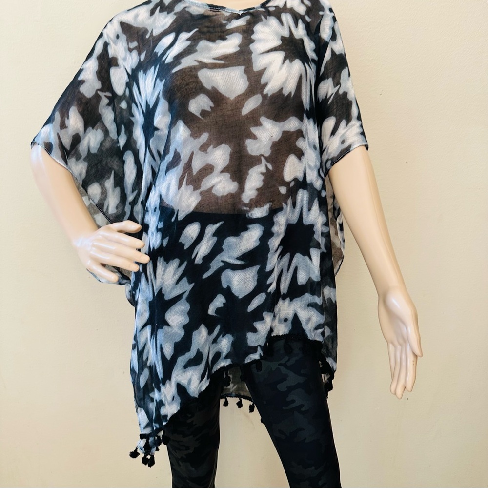 Sheer bathing suit cover up with tassels